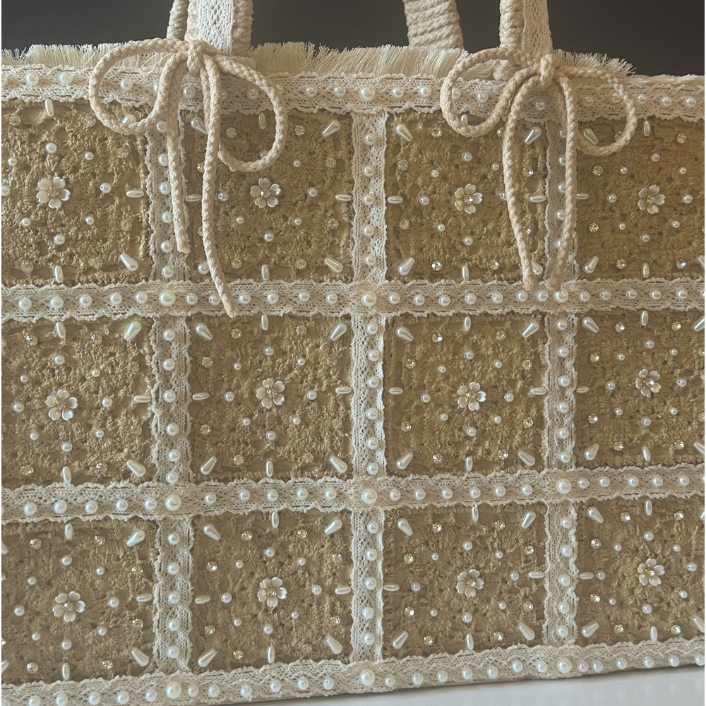 Handmade embellished crochet laptop tote bag